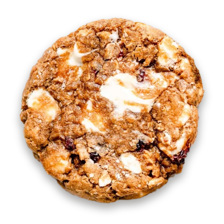 A cookie with white chocolate and cranberries
